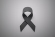 Skin cancer. Black ribbon as a symbol of skin cancer awareness. 3d render