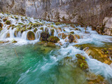 Fototapeta  - The waterfalls in Plitvice Lakes National Park, Croatia.