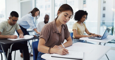 Aufkleber - Woman, students and writing with test in classroom for exam, study or assignment at university. Female person or group busy on project or essay with notebook for higher education, lesson or learning
