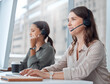 © peopleimages.com - Coworking, call center and telemarketing of consultant woman with web help conversation at computer. Customer service, crm and smile of digital support agent in office with communication and advice