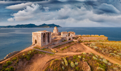 Wall Mural - Dramatic summer view from flying drone of old Methoni Castle. Aerial seascape of Ionian sea. Beautiful outdoor scene of Peloponnese peninsula, Greece, Europe. Travel the world..