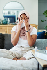 Poster - Muslim, woman and sick or sneezing on couch in living room with illness, flu and tired at home. Female person, lounge and fever with medication to relax, chill and calm on sofa for recovery or rest