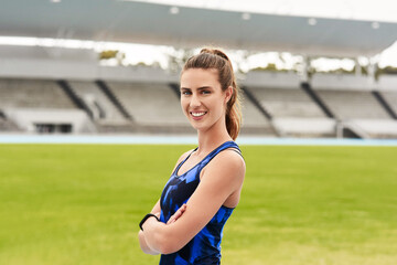 Sticker - Arms crossed, fitness and portrait of sports woman in stadium or competition, performance or training. Exercise, health and workout with confident athlete or runner at event venue for start of race