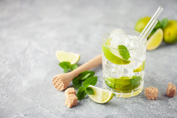 Wall Mural - Caipiroska cocktail with lime and mint in rocks glass