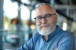 © Art Treasure - Close up photo portrait of successful and happy businessman, mature boss with beard and glasses working inside modern office building, senior investor, Generative AI