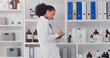 © peopleimages.com - Woman, scientist and clipboard for inventory in lab stock room for equipment check and analyse products. Female pharmacist, checklist and bottles chemical supply in laboratory for research and work.