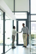 © peopleimages.com - Teamwork, greeting or business people shaking hands in meeting or corporate b2b agreement. Thank you, handshake or financial advisor with job promotion, deal negotiation or partnership opportunity