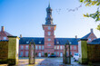 Castle of Husum, Germany in the morning with clear sky, horizontal view with entrance fence in front, low angle view