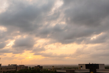 Wall Mural - dramatic and colorful sunset. photo taken of a sky clouds in san antonio texas after a rainstorm