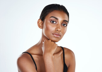 Portrait, skincare and beauty of Indian woman in studio for body wellness isolated on a white background mockup. Face, cosmetics and serious model in makeup for dermatology, shine or glow for health