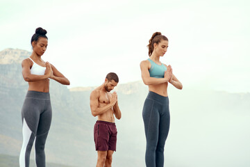 Poster - Meditation, training and yoga with friends on beach for mental health, peace or wellness in morning. Exercise, fitness and zen with sporty people outdoor on coast by mountain for balance and mindset