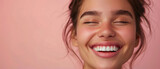 Fototapeta  - Beautiful laughing teenage girl face showing off her smooth white teeth that perfectly match her natural looking skin on an elegant soft pastel color background created with Generative AI Technology
