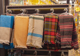 Fototapeta  - Colourful Modern Wool Shawls Wraps Hanging in Store
