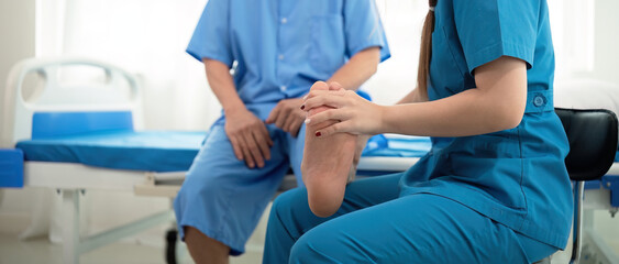 healthcare, physiotherapist and patient with foot injury, stretching and recovery with treatment, he