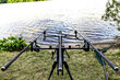 Carpfishing session at the Lake.Carp fishing rods standing on special tripods.Scenic landscape overlooking lake at Dawn.Fishing adventures, carp fishing.