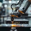 An industrial robot arm is welding a metal sheet.
