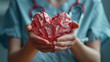 © photo for everything - Closeup, Doctor holding stethoscope with heart pink model. medical and healthcare concepts.