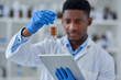 © peopleimages.com - Hands, scientist and liquid for test with tablet in lab for medical study, chemistry development or digital analysis. Gloves, black expert or vial for healthcare inspection or drug trial breakthrough