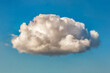 Single cloud isolated over blue sky background