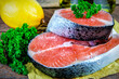 Steaks of red fish with parsley and lemon