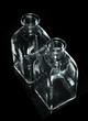 Glass bottles isolated on a black background