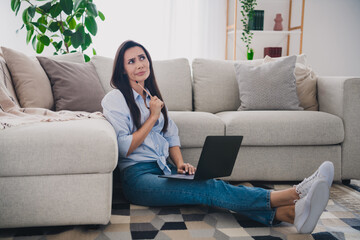 Sticker - Full size photo of nice lady sit floor contemplate wear blue shirt bright interior flat indoors