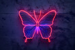 An isolated neon light butterfly on a dark background