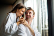 Happy young couple in love enjoying wellness spa resort treatments.