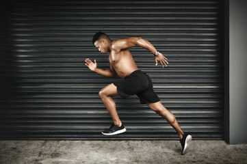Wall Mural - Shirtless, black man or sprint at speed, fitness or vision of exercise, energy or thinking of health. Fast, muscular or male runner as planning, idea or dream of cardio, training or power performance