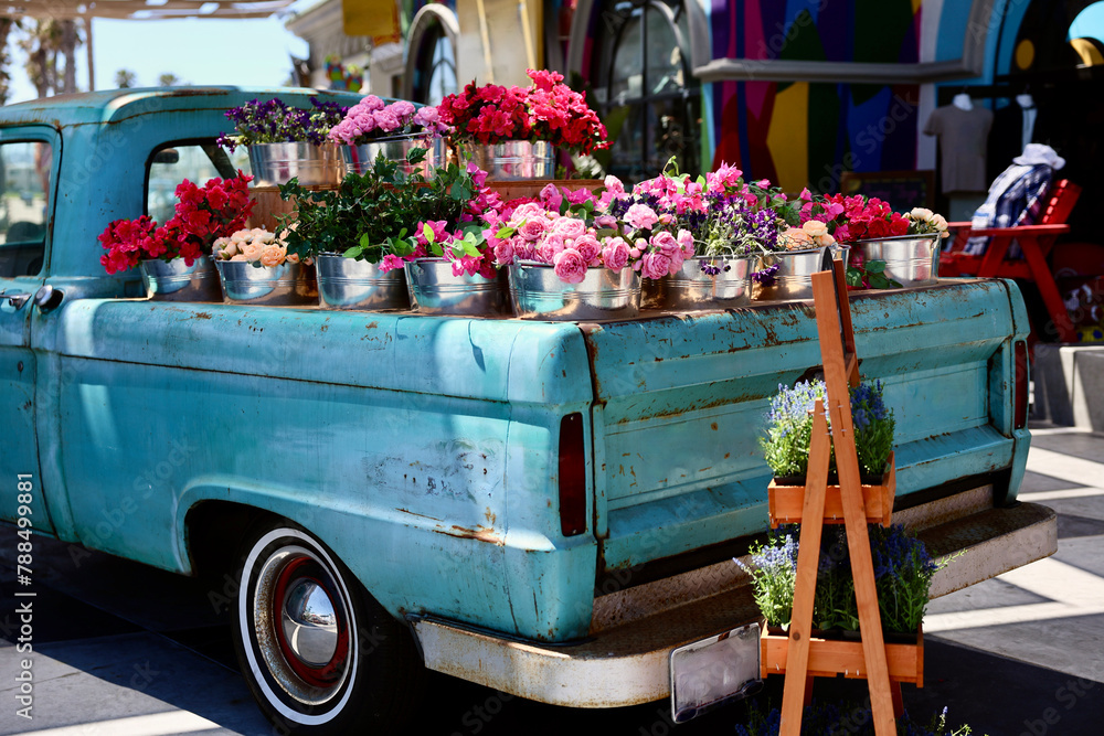 old fashioned pickup truck with a bed full of flowers Stock Photo ...