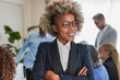 © Sabrina - Multiracial people working inside modern office - Young african business woman smiling and posing in front of camera - Entrepreneurs and colleagues concept