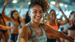 Enthusiastic individuals join a dance fitness class, moving to the rhythm of upbeat music and dynamic choreography, experiencing the joy and exhilaration of movement and activity.