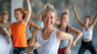 © NeoAstra - A group of middle-aged women enjoying a  dance in gym class. Active lifestyle in menopause