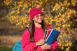 © be free - school education of teen girl. knowledge day on september. autumn september is schooling time. september 1. teen girl with school homework. girl enjoy fall outdoor. back to school. Lifelong learning