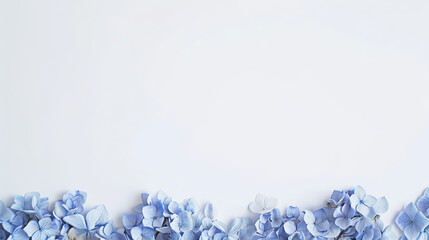 Wall Mural - White background with a frame of blue flowers at the bottom.
