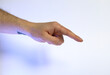 caucasian hand doing communication gesture , pointing out