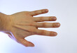 caucasian hand doing communication gesture , spread fingers