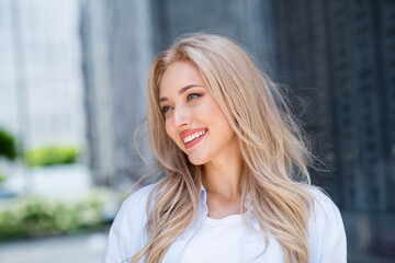 Wall Mural - Photo of shiny adorable gorgeous woman walking alone summer sunny day big town megapolis outdoors