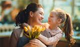Fototapeta  - daughter and mom with flowers