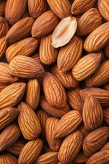 Canvas Print - A close up image of a pile of almonds, perfect for food and nutrition concepts