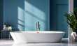 Escape to indulgence: Partial view of a serene bathroom, light blue walls. A pristine bathtub beckons beside a table with a lush plant, illuminated by natural light