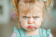 Portrait of a little girl with tears on her face, close up, child tantrum concept