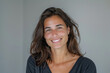 © MagnusCort - A woman with long hair is smiling for the camera
