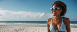 Fototapeta  - Young black beautiful women smiling in swimsuit sunglasses on the beach. Concept, vacation, template, copy space, banner,