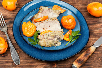 Wall Mural - Baked pork meat with medlar or loquat.