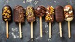 Ice cream on stick coated with various chocolate glazes and toppings top view