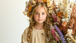 Child with Autumn Floral Arrangement