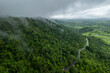 © AmazingAerialAgency - Aerial view of forested mountains and treetops, Malshej Ghat, Maharashtra, India.