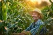 © Alina - Senior farmer standing in corn field