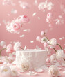 White ranunculus flowers and falling petals on pink background with textured lighting and shadows. Studio shot